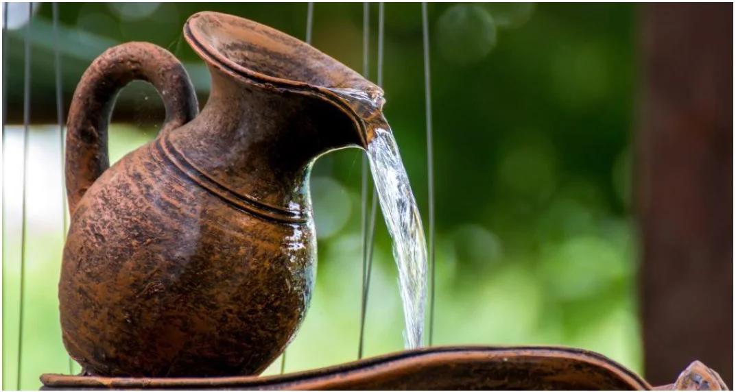 Pouring pot water feature close up